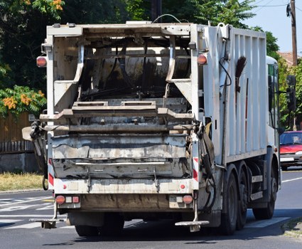 Operatives using PPE during commercial rubbish collection
