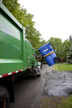 Workers sorting recyclables at a commercial site